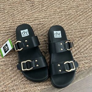 Dolce Vita Black Sandals with Gold Buckles